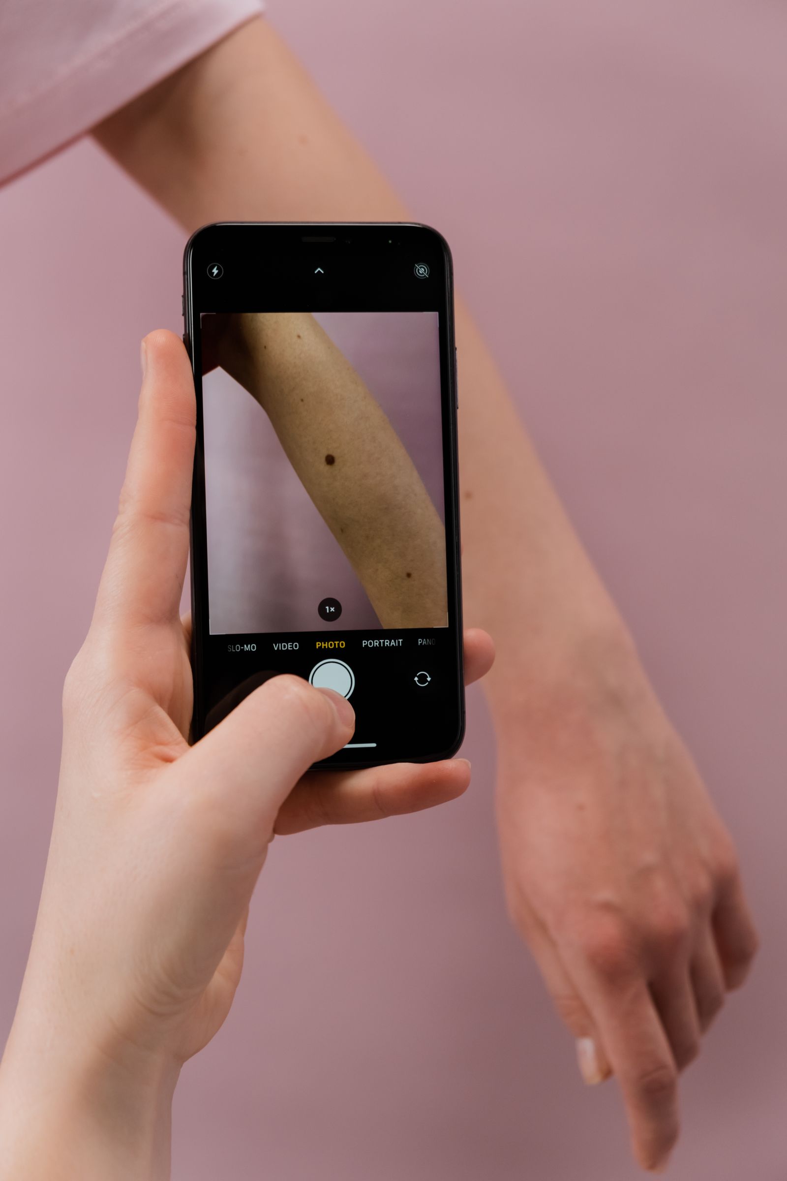 Editorial image of a close-up skin assessment.